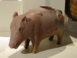 Vessel in the shape of a pig, Hacılar, In the middle of the 6th millennium BC.